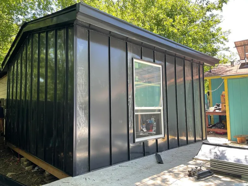 Black standing seam metal wall panels for Metal Roof Installation in Battle Creek