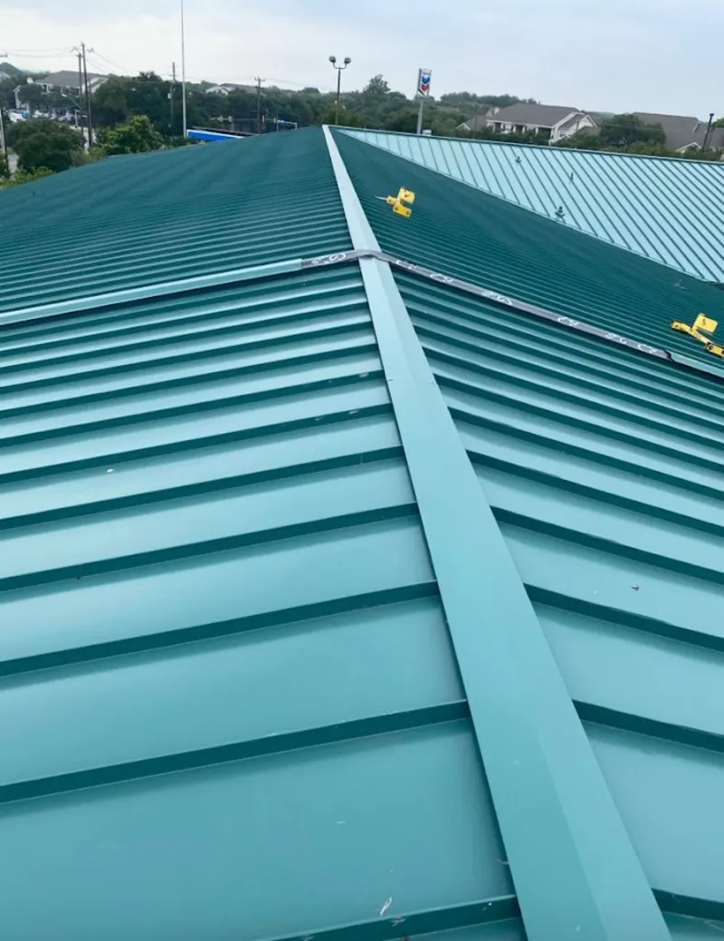 Green commercial metal roof ridge and valley for Metal Roof Repair in Battle Creek